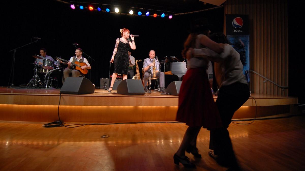 Couple dances to live band in the International Ballroom